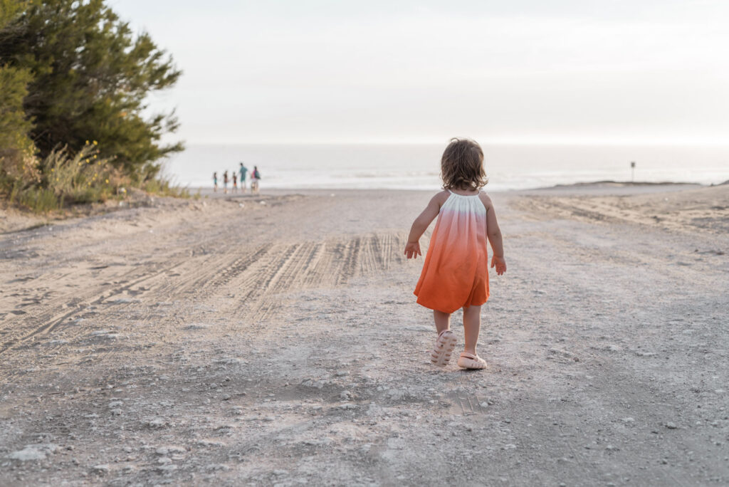 Little girl walking on the beach – beach family photos Bloemendaal aan Zee